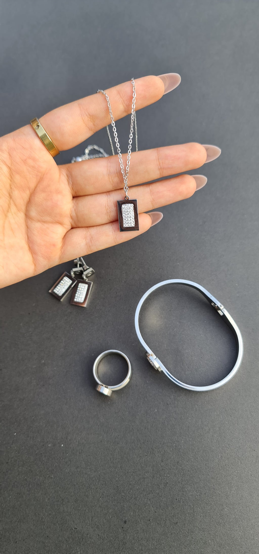 Stainless Steel Bracelet, Necklace, Ring, and Earring Set