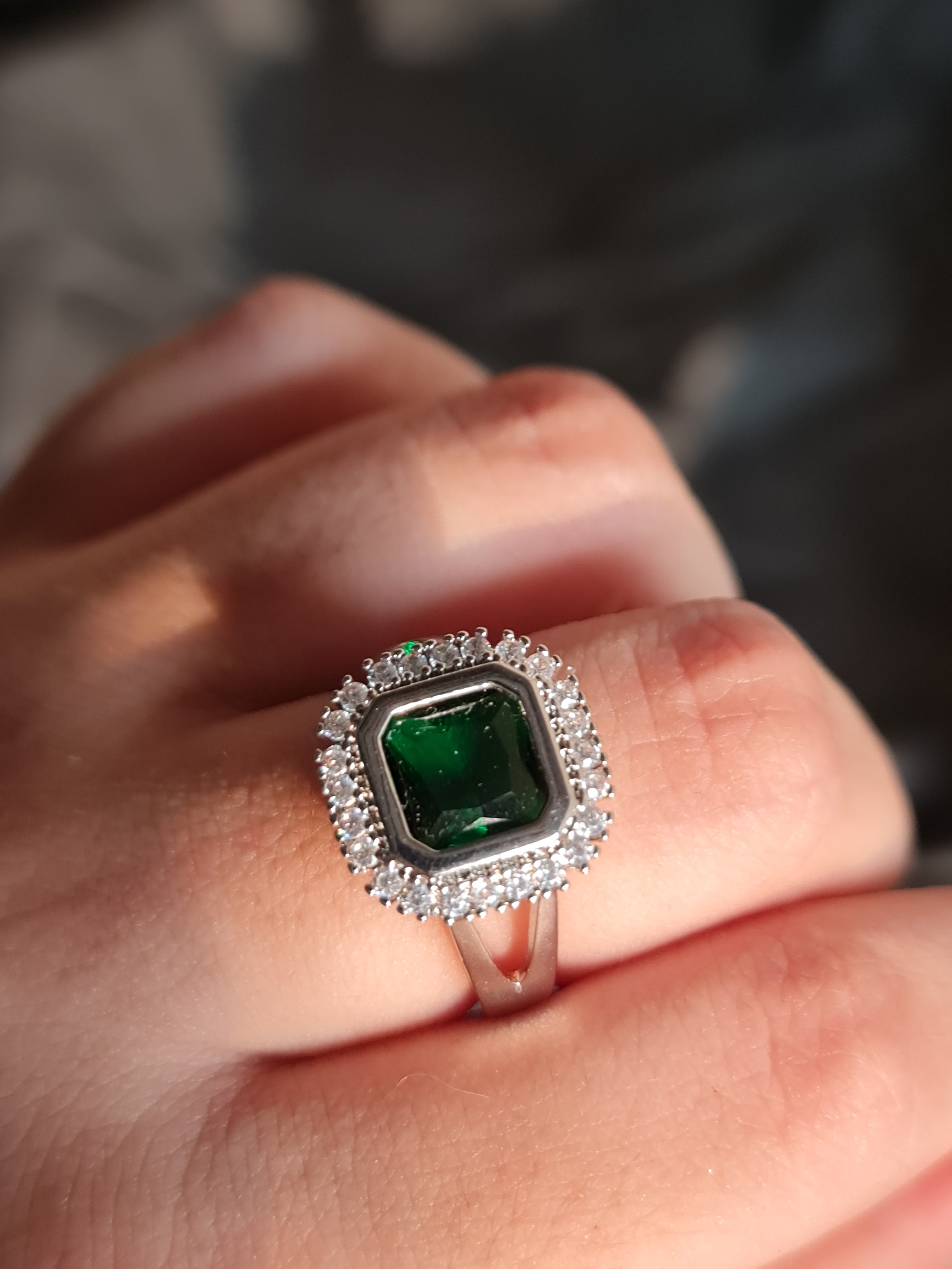 Elegant Emerald Green & Zircon Halo Ring