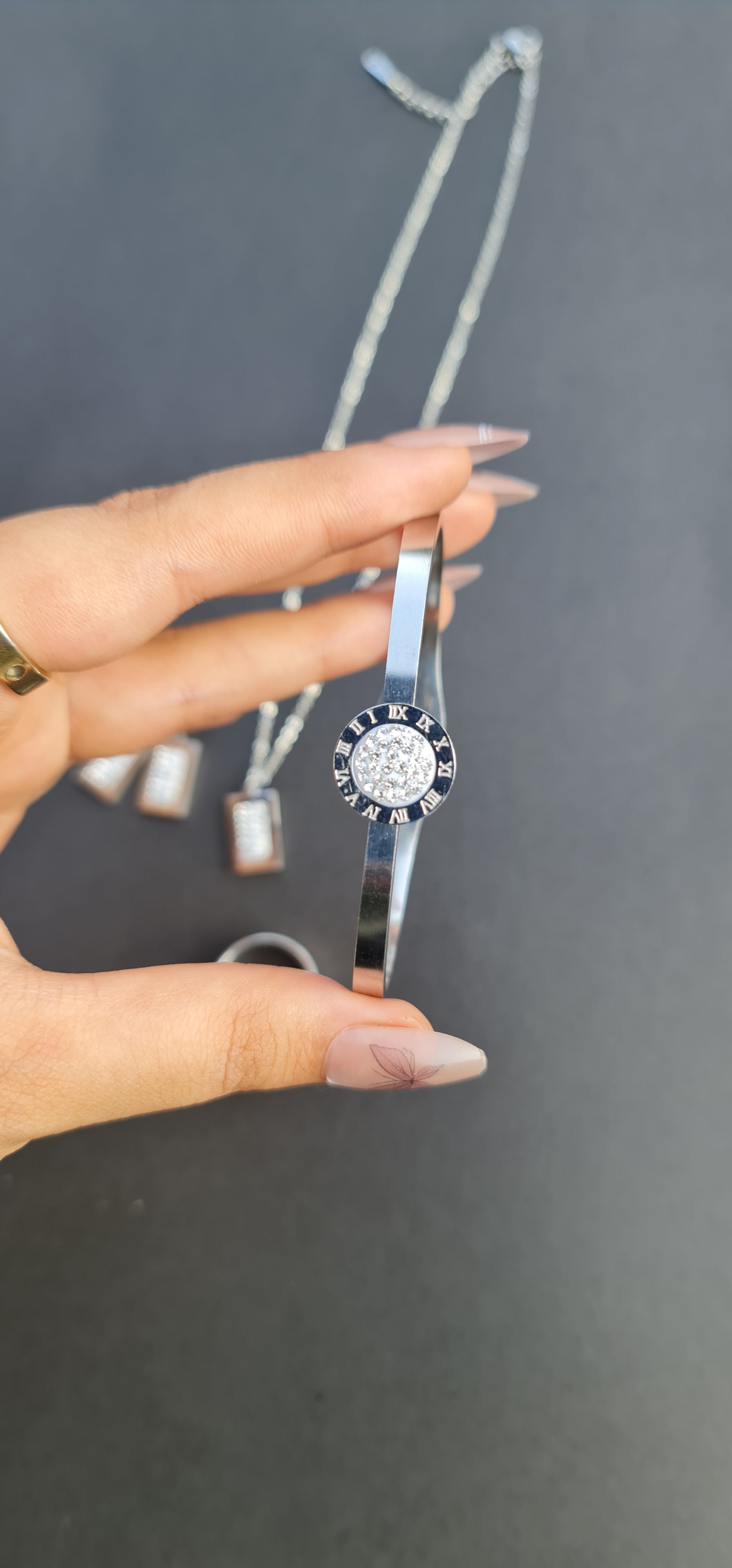 Stainless Steel Bracelet, Necklace, Ring, and Earring Set