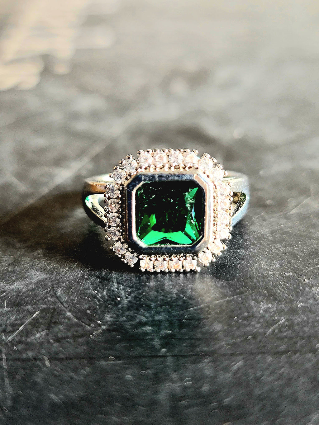 Elegant Emerald Green & Zircon Halo Ring