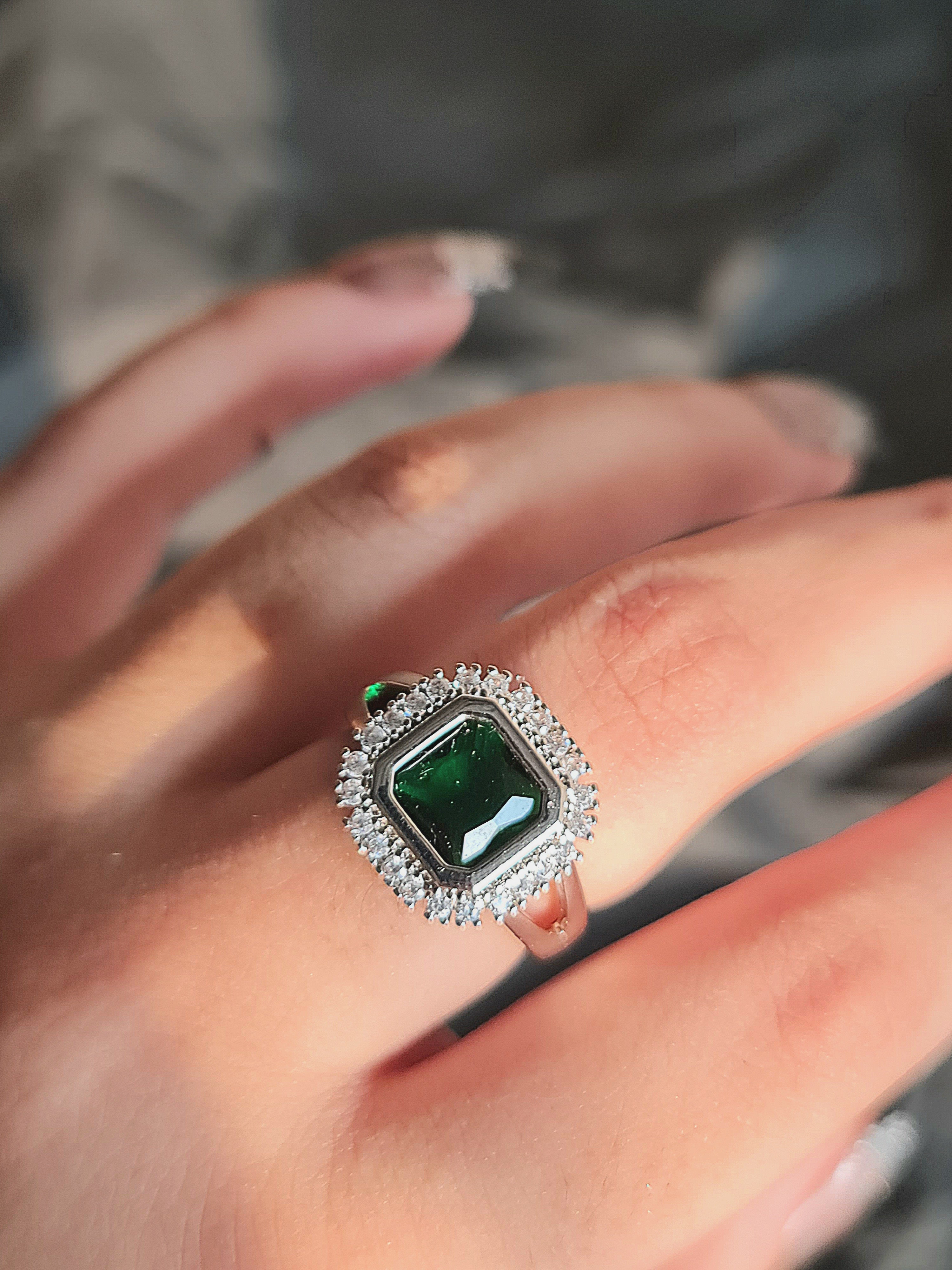 Elegant Emerald Green & Zircon Halo Ring