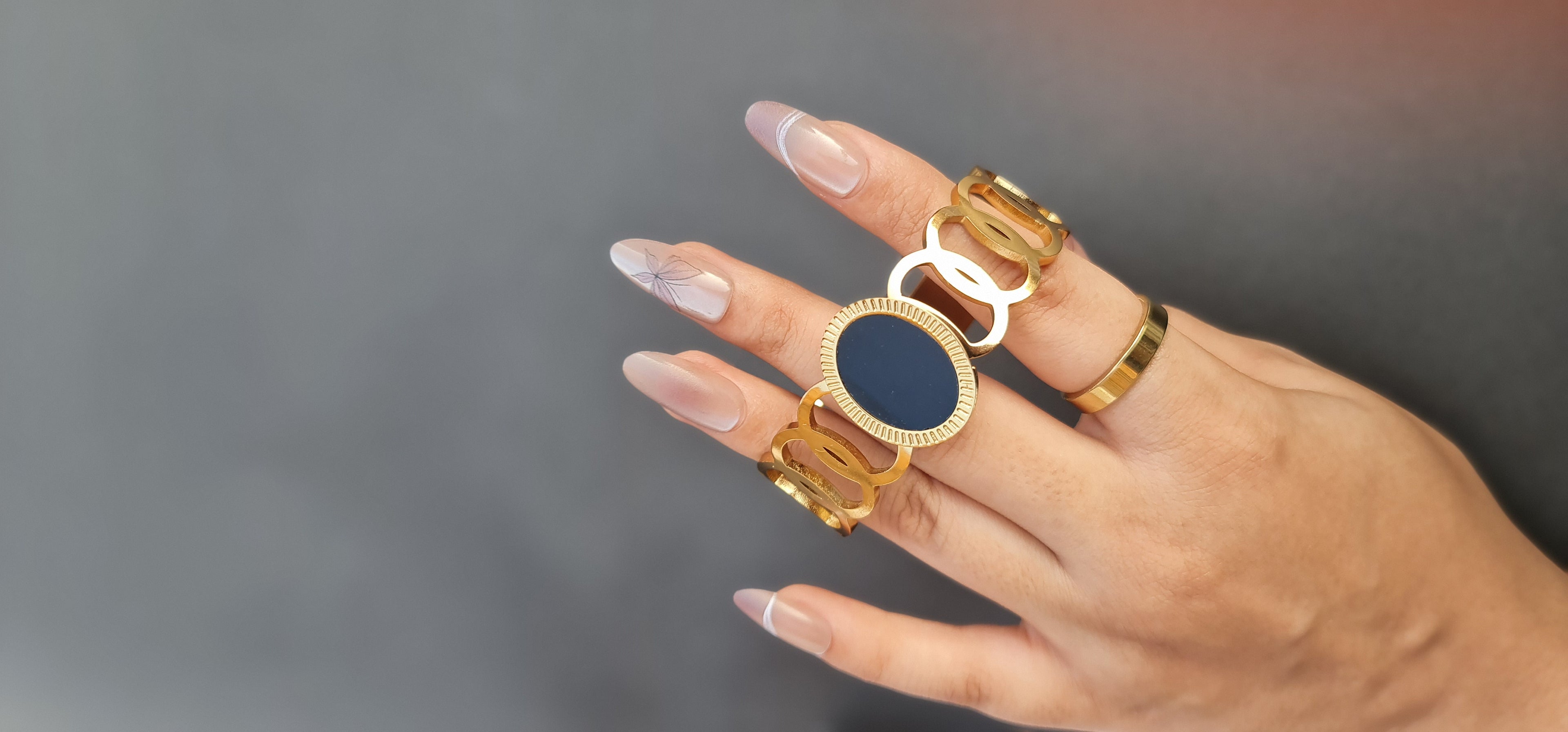 Gold-Toned Stainless Steel Chain Bracelet with Black Inlay
